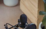 microphone on tripod attached to laptop in studio